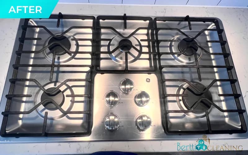 After: Stainless gas cooktop with five burners