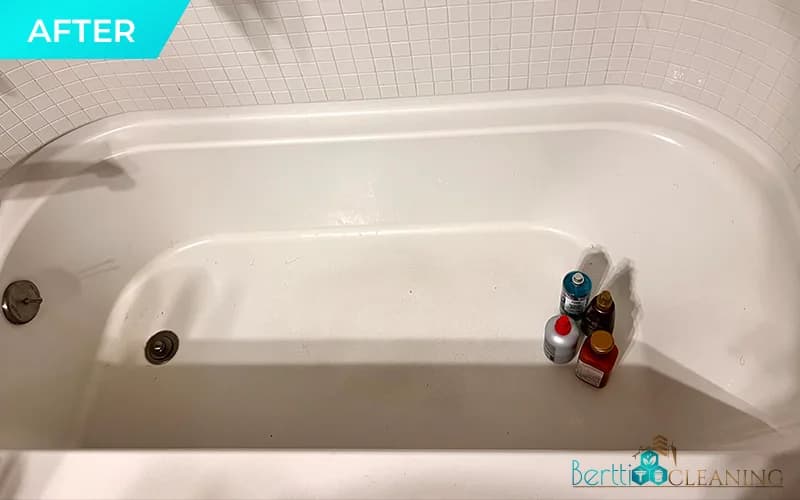 After: Bathtub with mildew along the bottom