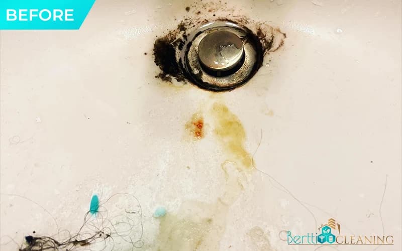 Before: Bathroom sink drain, built-up grime around the ring